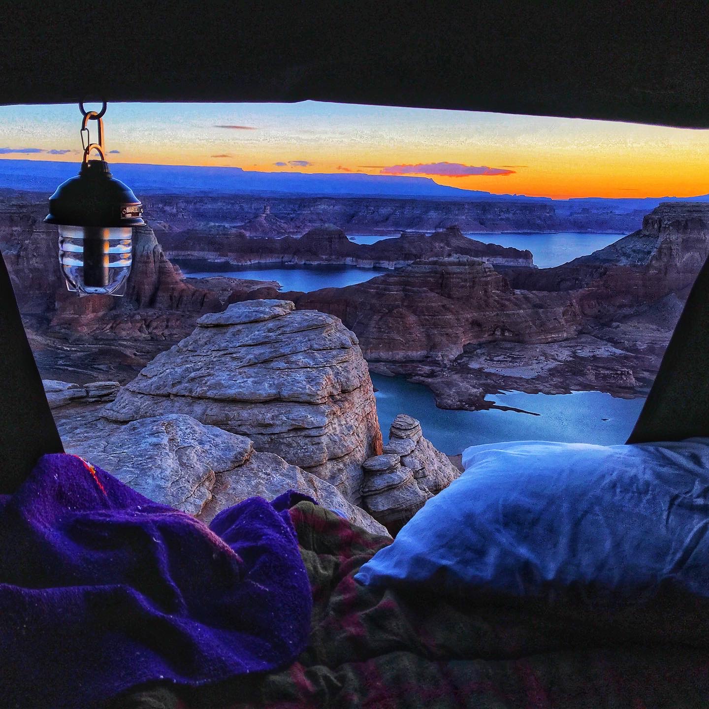A scenic view of nature from a car roof tent.